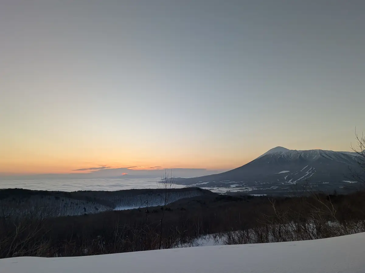 Dawn over a sea of clouds, with Mt. Iwate on the horizon